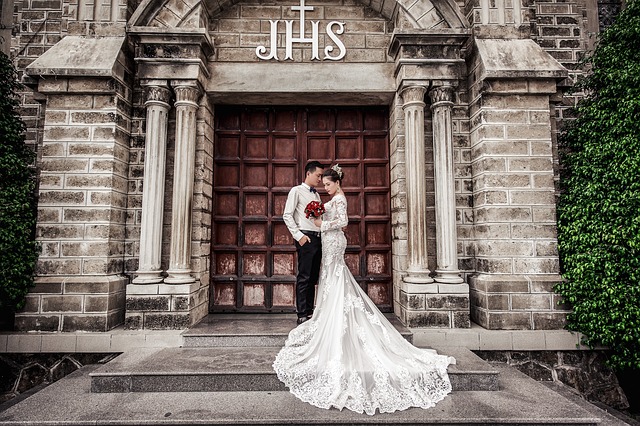 Newlyweds in front of church